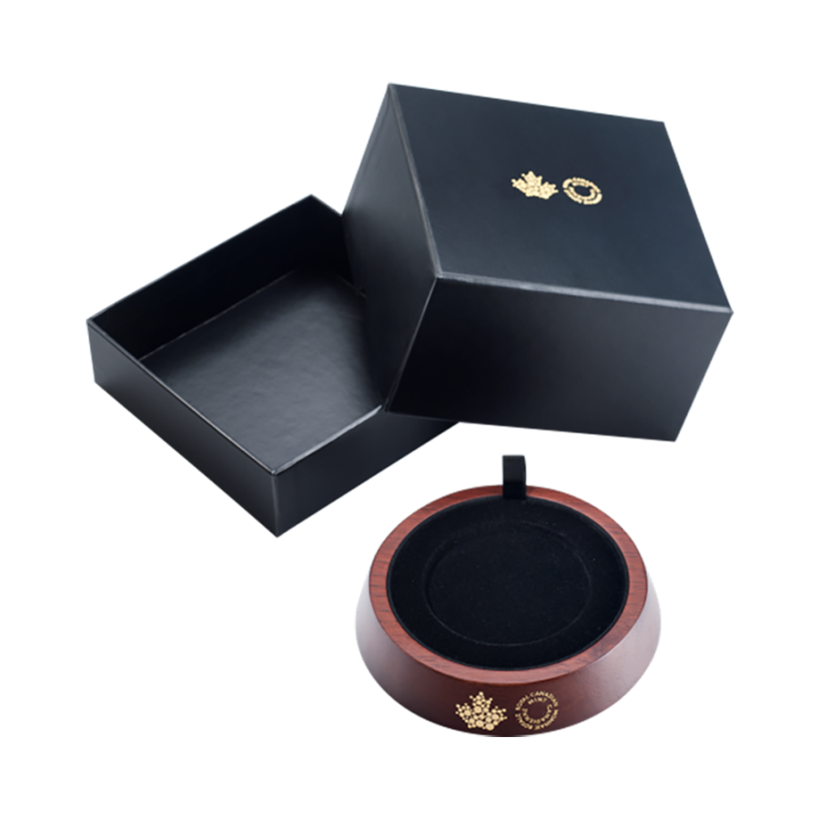 Five-ounce silver coin and two Christmas presents